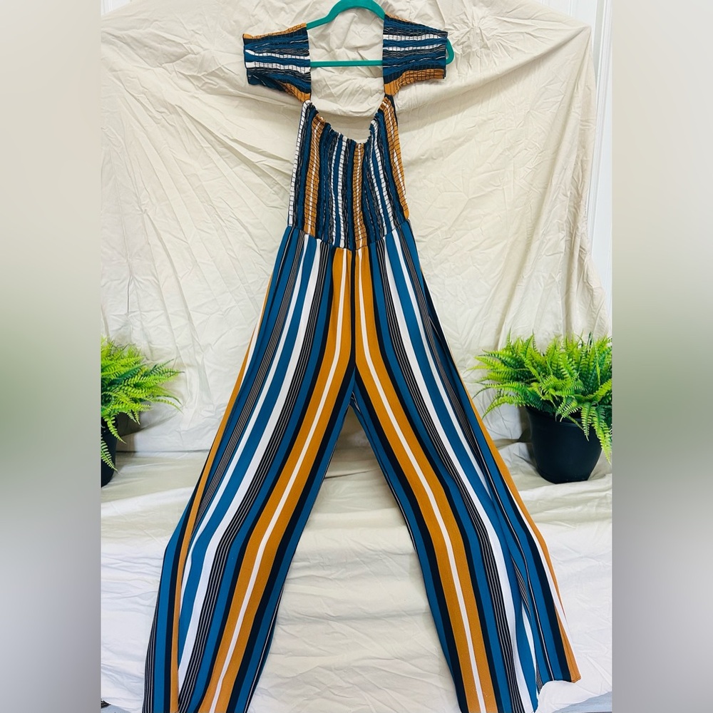 Large striped romper off the shoulder sleeves